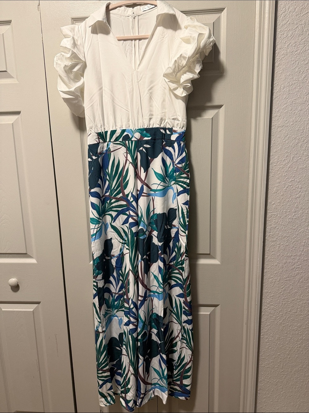 White Ruffle-Sleeve Jumpsuit with Green & Blue Tropical Print